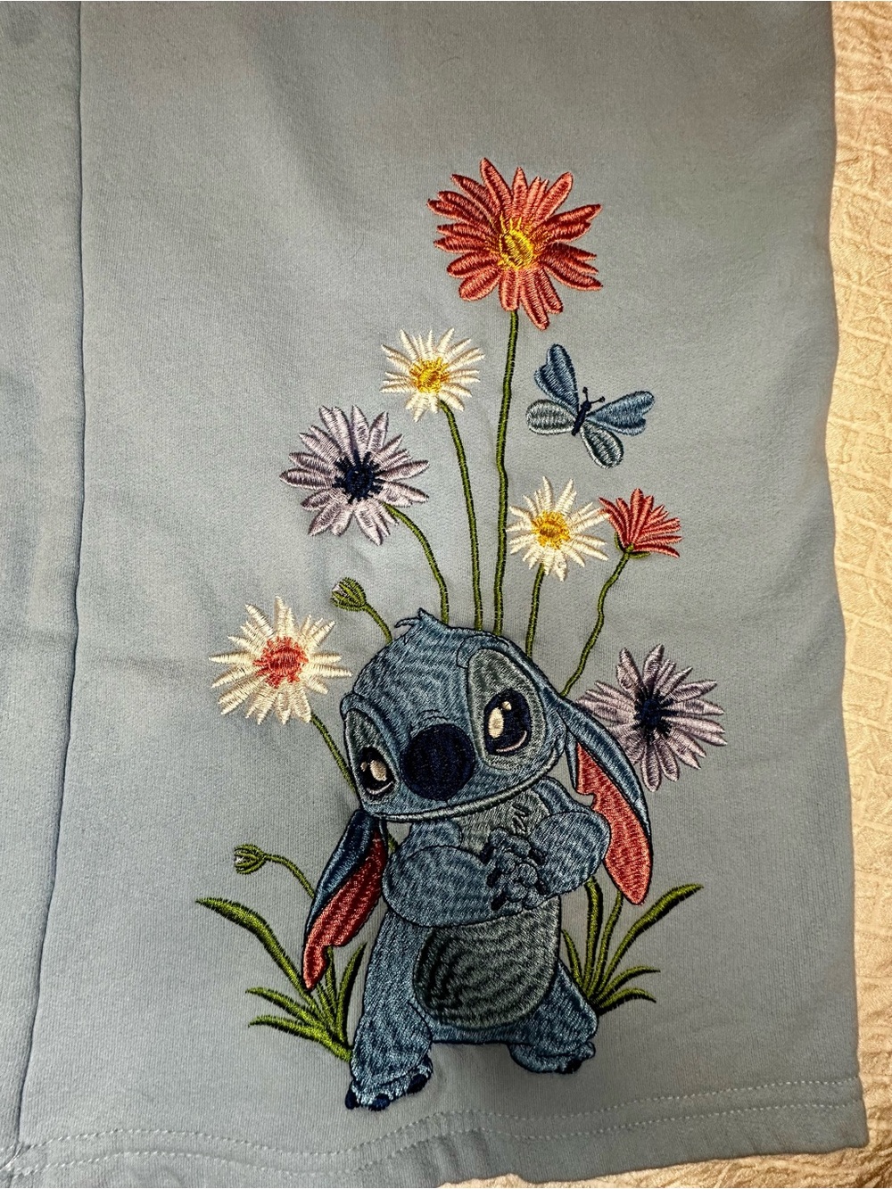 Disney Light Blue Stitch Track Pants with Floral Embroidery (large)